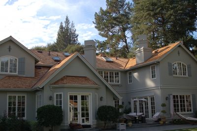 Light grey house with wood natural shingles